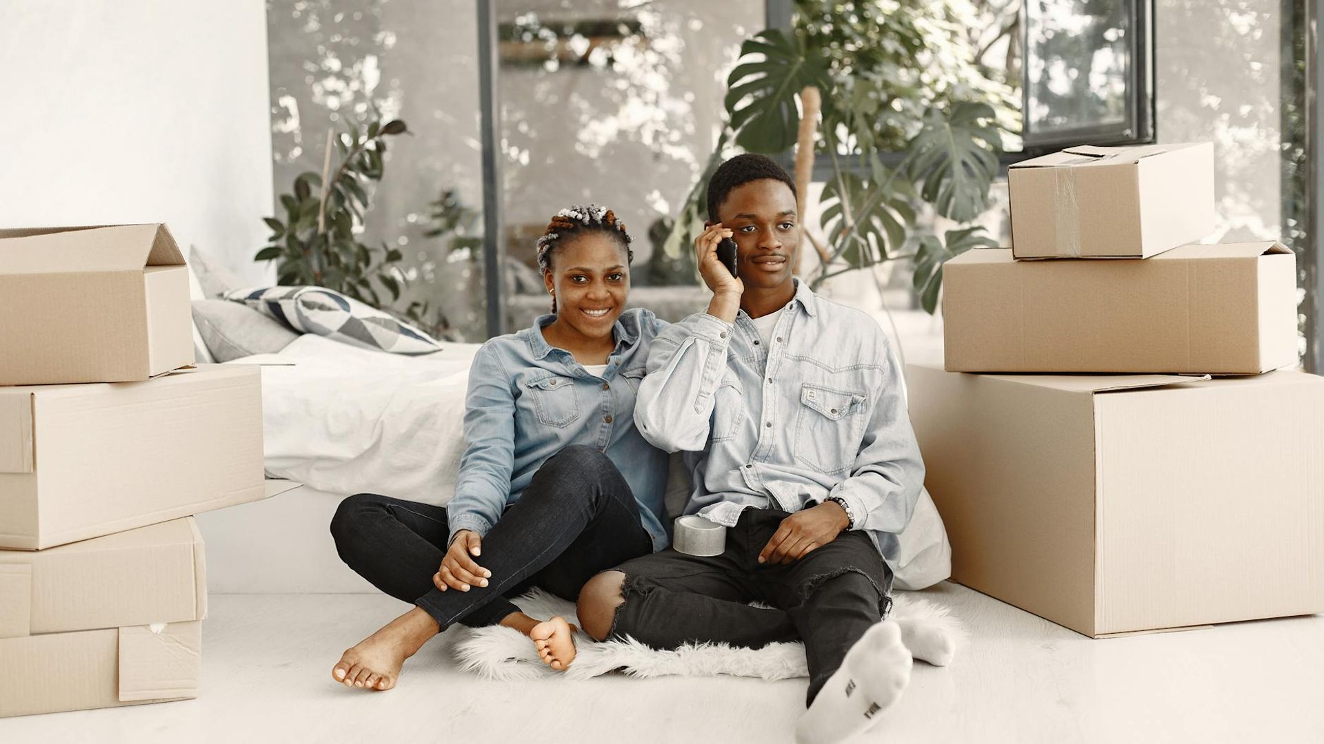 Person moving rhythmically in a bright airy studio space.